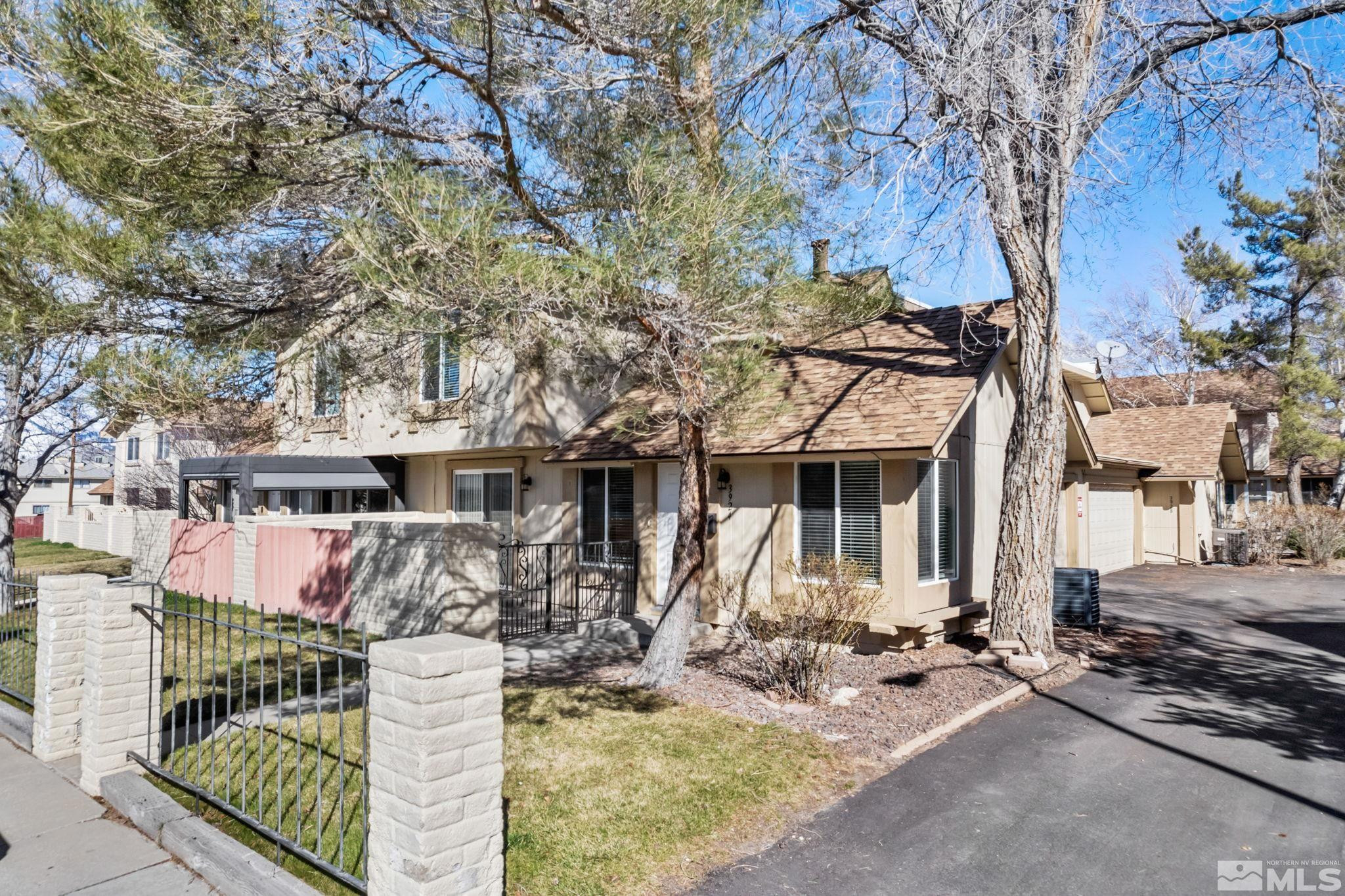 3924 Pheasant Drive Carson City, NV 89701 - Photo 8 of 38 a front view of a house with patio