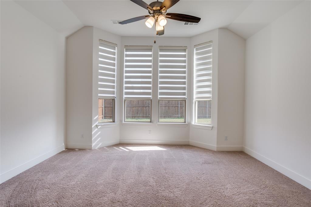 717 Corner Post Path Celina, TX 75009 - Photo 7 of 12 a view of an empty room with a window