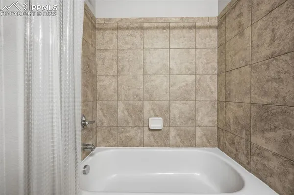 a bathroom with a bathtub