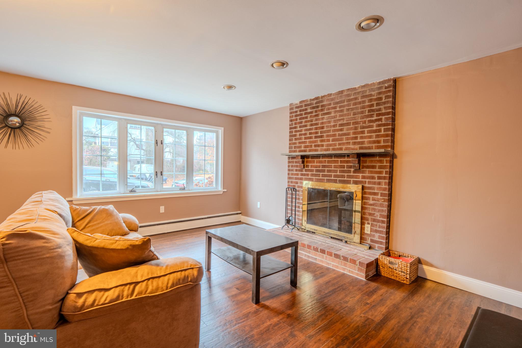 613 Seville Street Philadelphia, PA 19128 - Photo 20 of 37 a living room with furniture and a large window