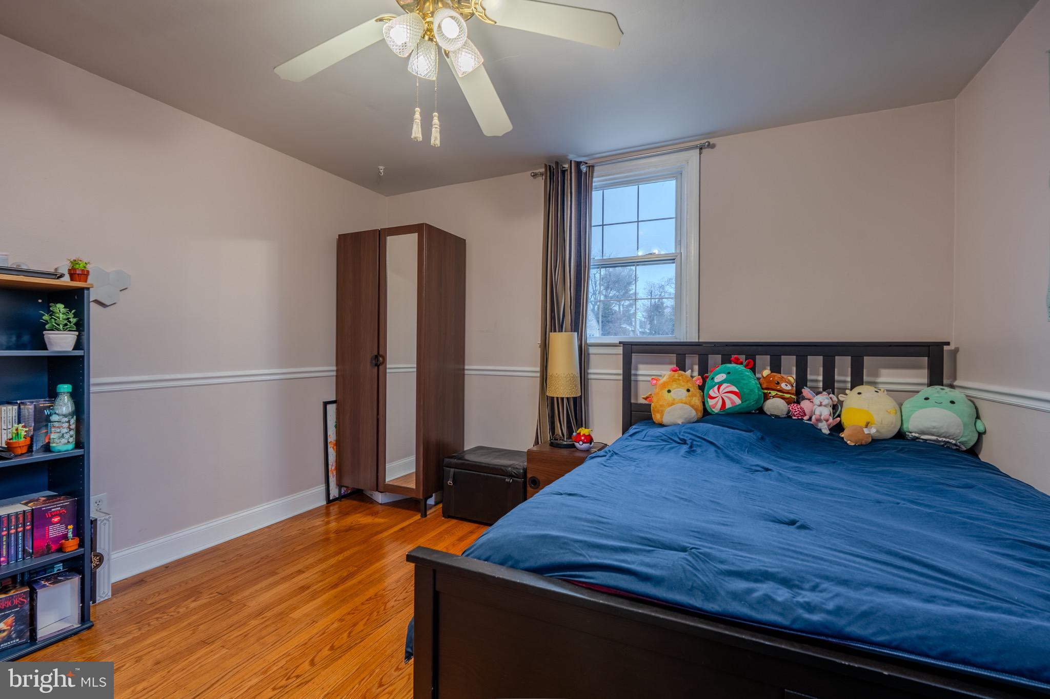 613 Seville Street Philadelphia, PA 19128 - Photo 24 of 37 a bed room with a bed and a window