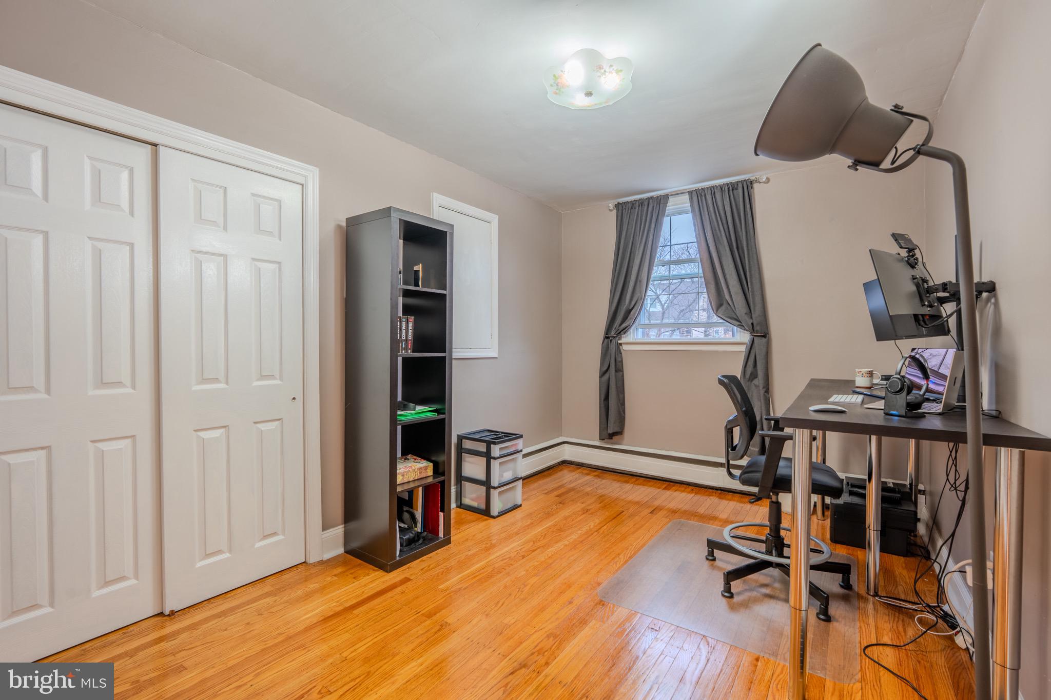 613 Seville Street Philadelphia, PA 19128 - Photo 26 of 37 a room with furniture and a window