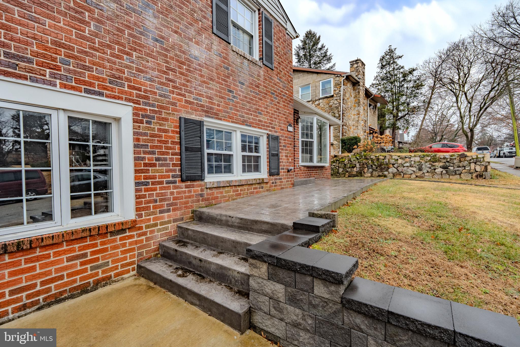 613 Seville Street Philadelphia, PA 19128 - Photo 5 of 37 a view of a house with pool fire pit next to a road