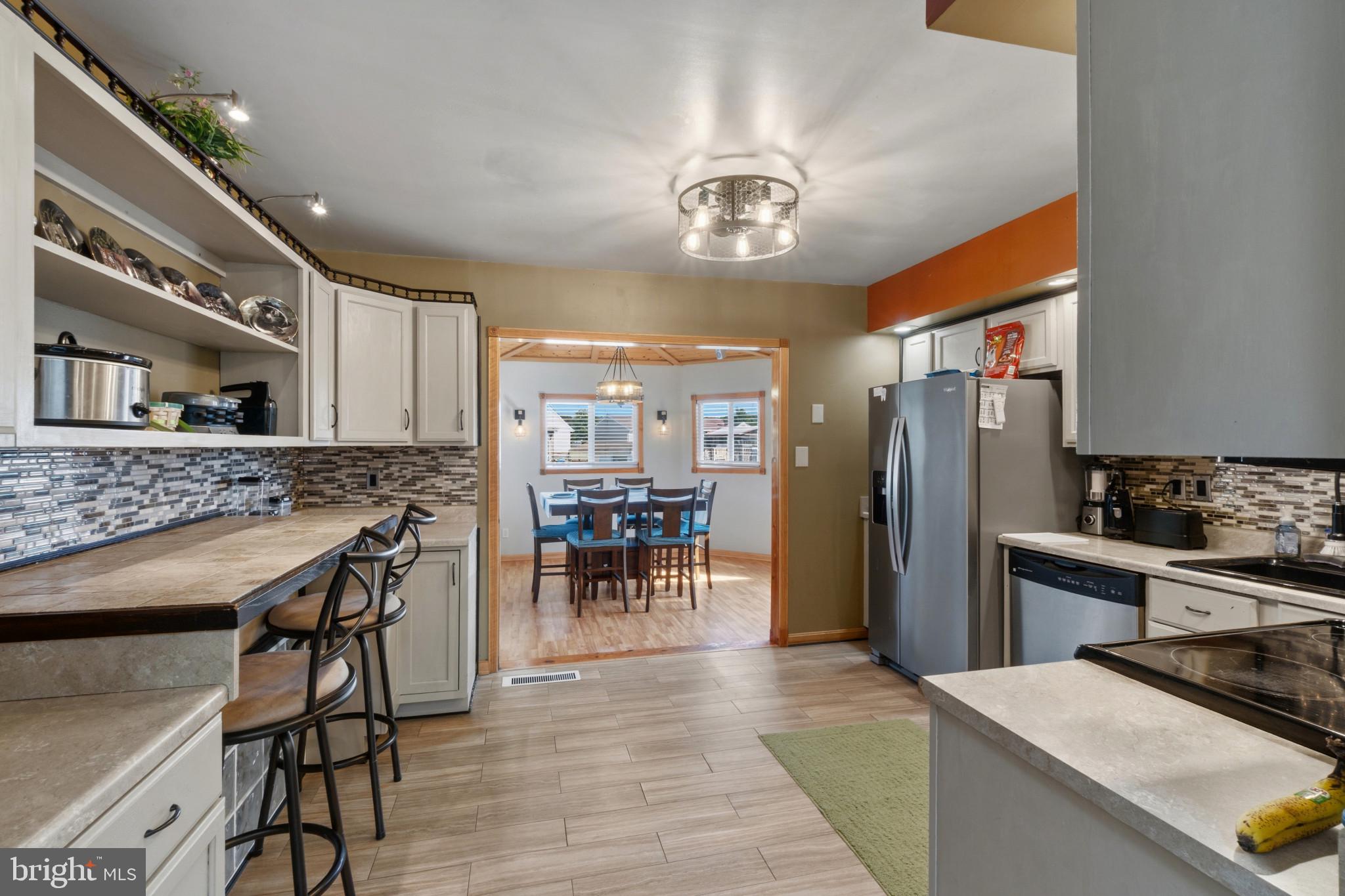 7113 Olivia Road Baltimore, MD 21220 - Photo 21 of 30 Kitchen with a view of the dining room