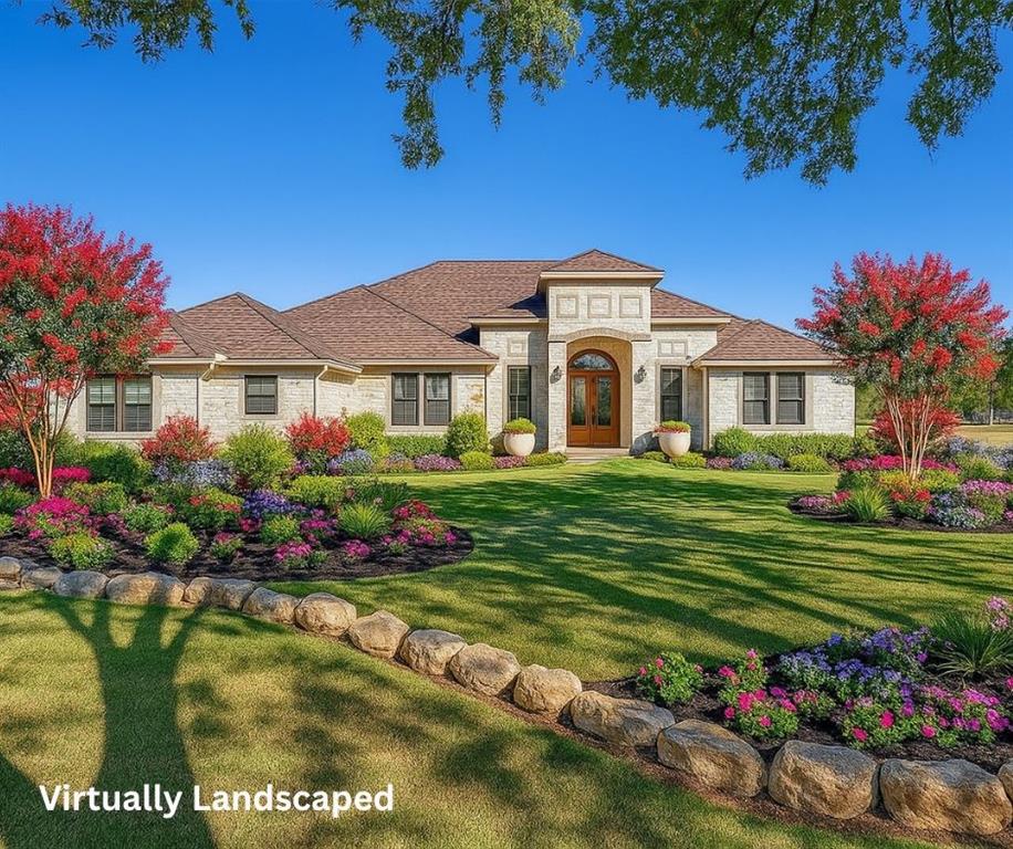 a front view of a house with a garden