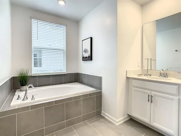 a bathroom with a sink and a bathtub