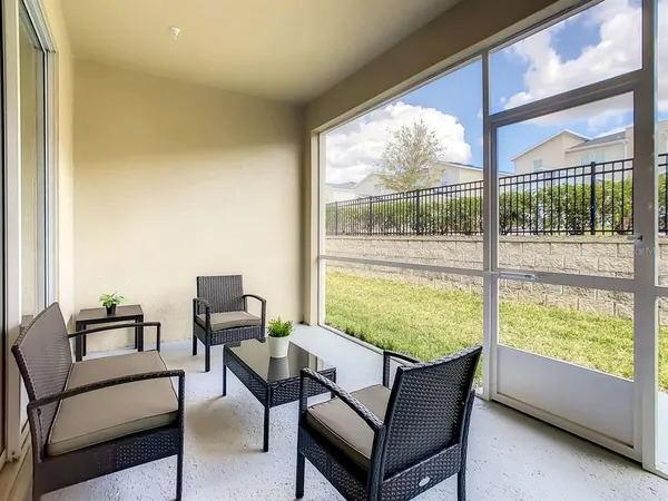 a view of a hallway with bathroom