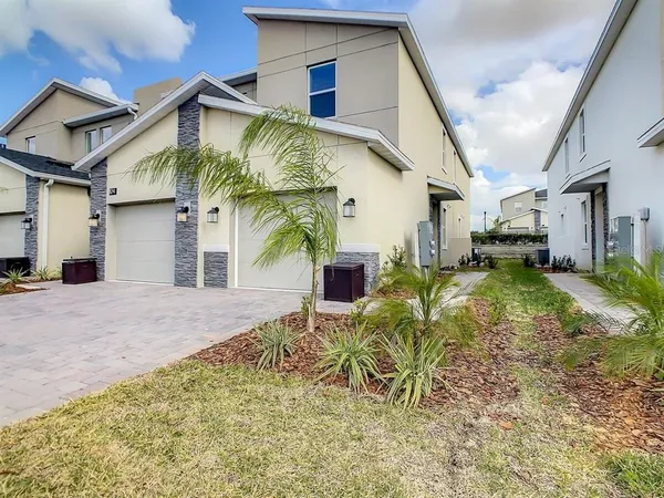 a view of a house with a patio