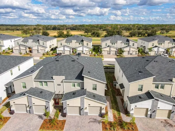 a view of swimming pool with outdoor seating