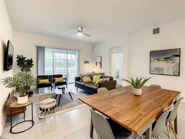 a living room with furniture and window