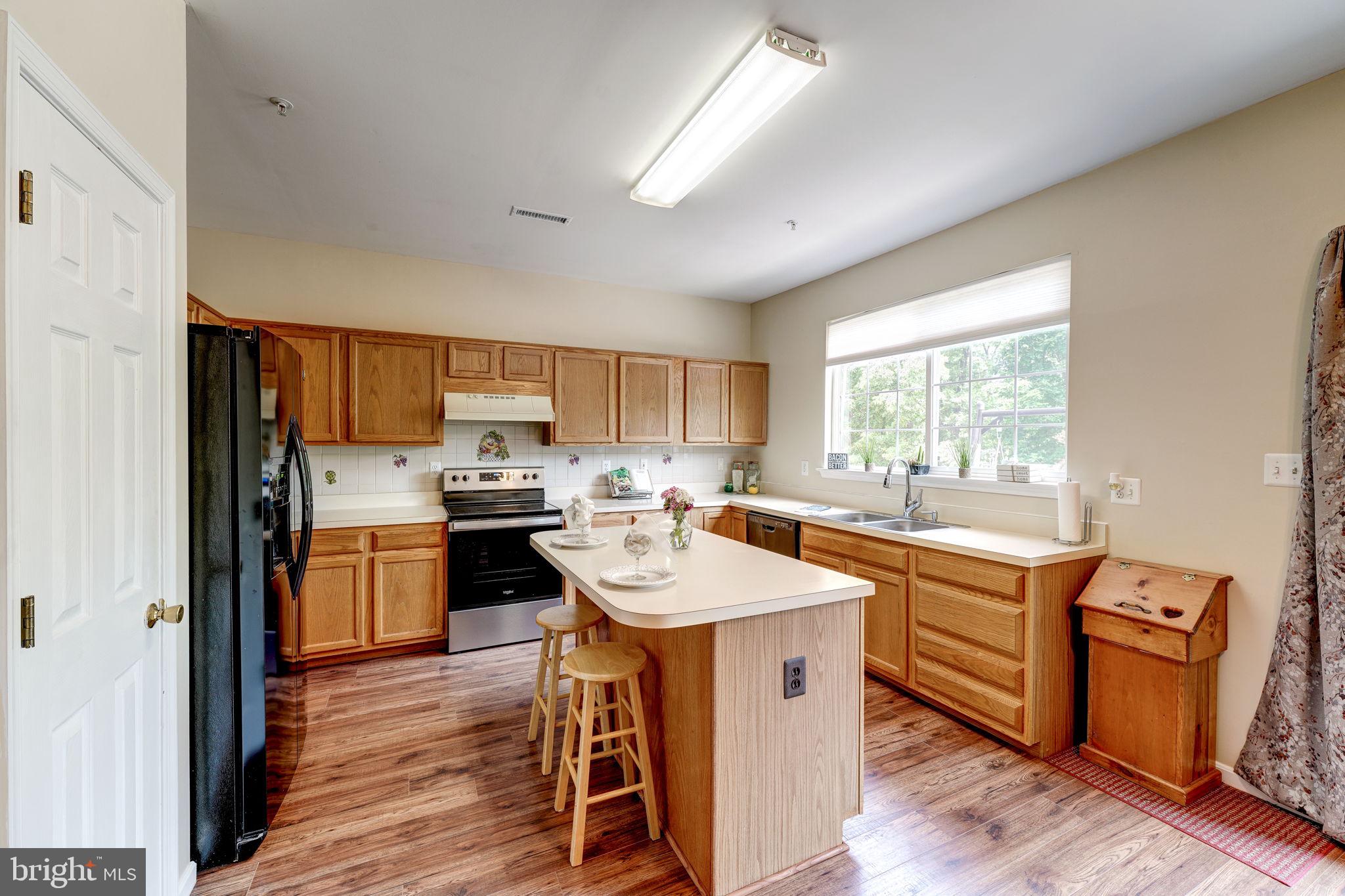2703 Summers Ridge Drive Odenton, MD 21113 - Photo 11 of 56 Kitchen with island for storage & seating