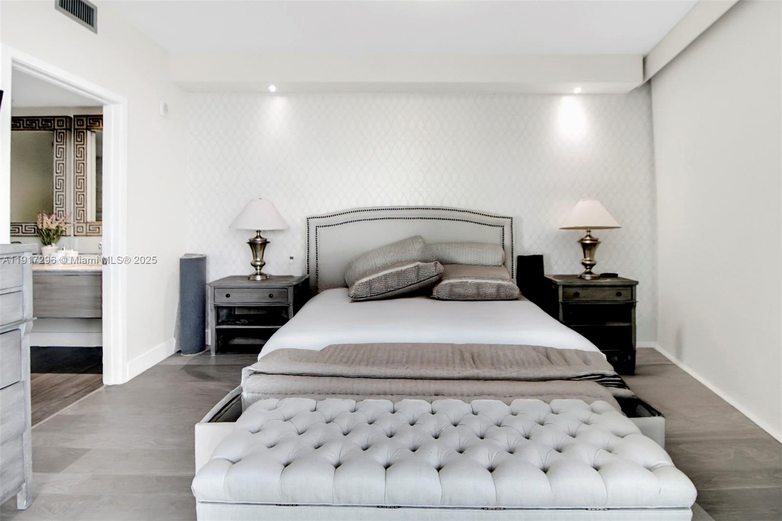 2900 Northeast 7th Avenue, Unit 1807 Miami, FL 33137 - Photo 11 of 36 a bedroom with a bed and a table