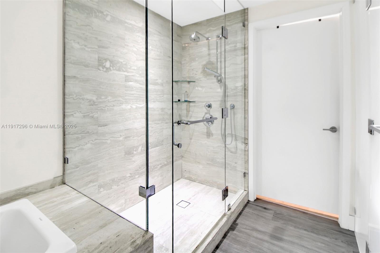 2900 Northeast 7th Avenue, Unit 1807 Miami, FL 33137 - Photo 15 of 36 a bathroom with a shower and a bathtub