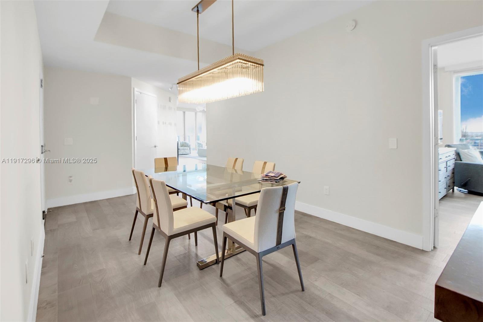 2900 Northeast 7th Avenue, Unit 1807 Miami, FL 33137 - Photo 27 of 36 a dining room with a table and chairs