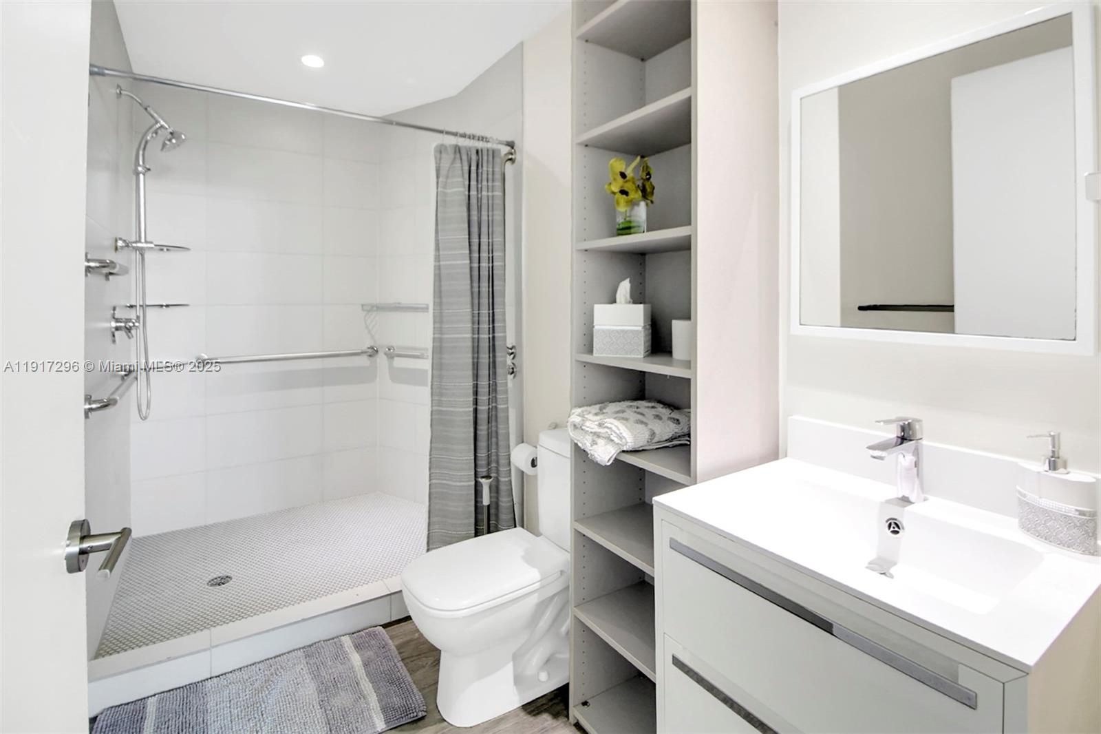 2900 Northeast 7th Avenue, Unit 1807 Miami, FL 33137 - Photo 29 of 36 a bathroom with a sink toilet and shower