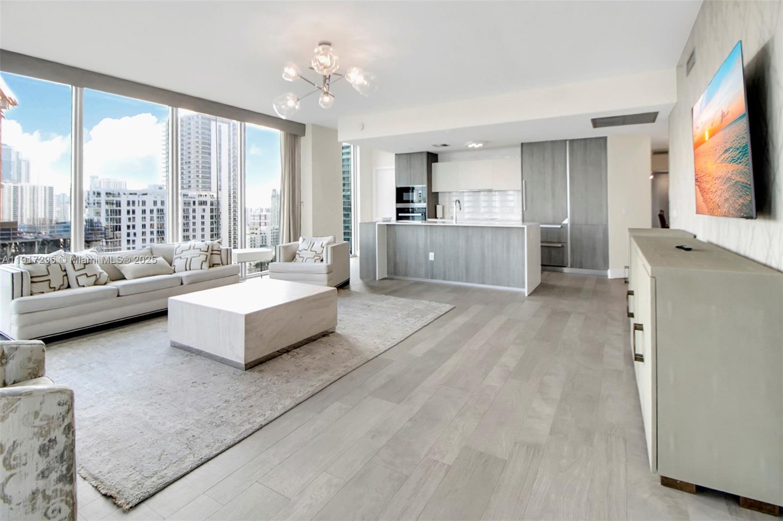 2900 Northeast 7th Avenue, Unit 1807 Miami, FL 33137 - Photo 4 of 36 a living room with furniture and a large window