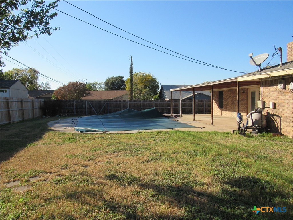 1325 Paseo Del Cobre Temple, TX 76502 - Photo 15 of 15 a swimming pool with outdoor seating and yard