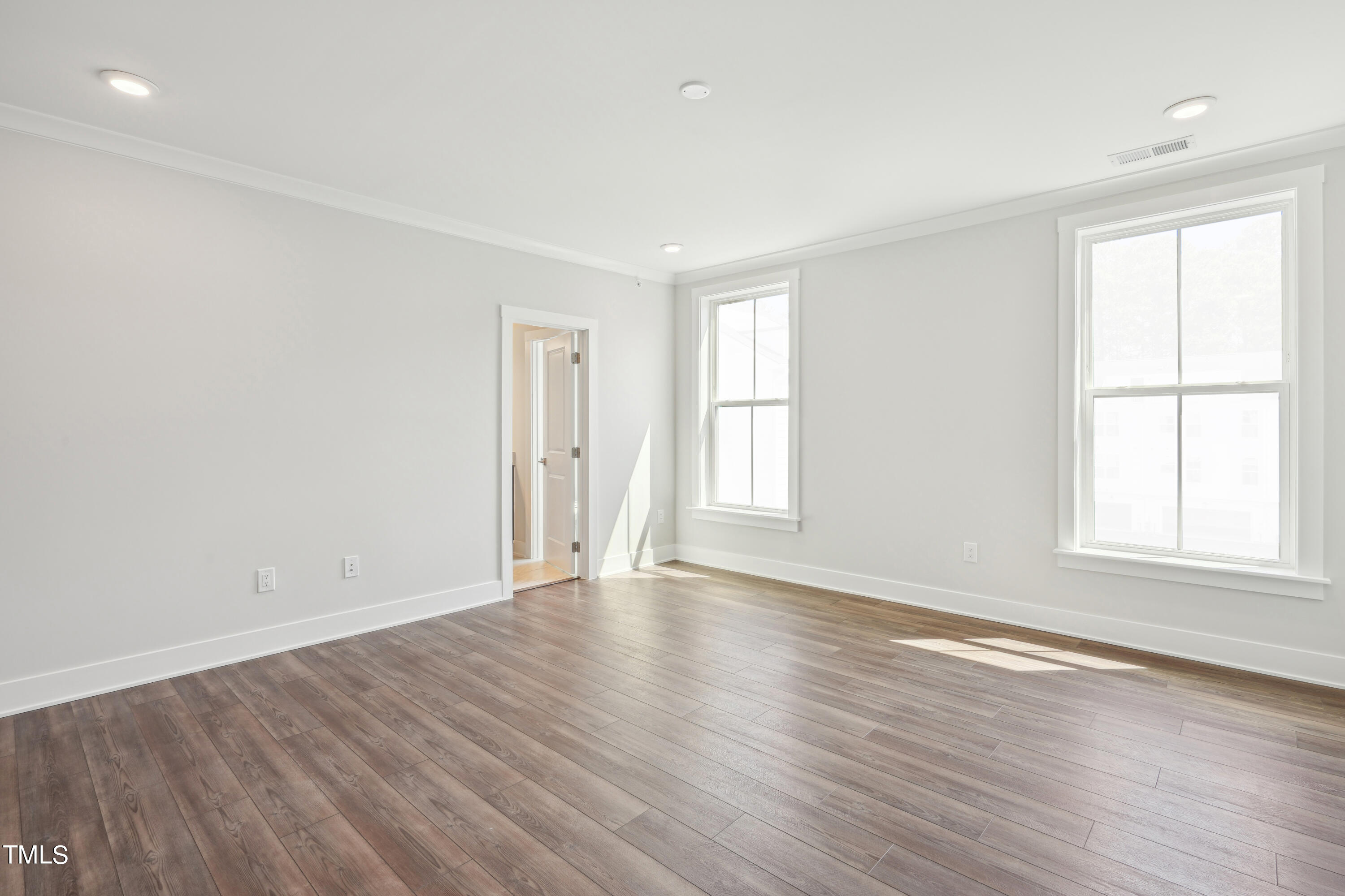 11548 Helmond Way, Unit 117 Raleigh, NC 27617 - Photo 12 of 38 Primary Bedroom