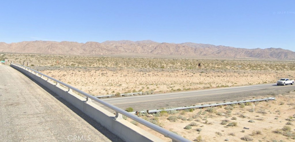 a view of lake and mountain