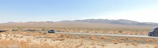 a view of mountain with lake view