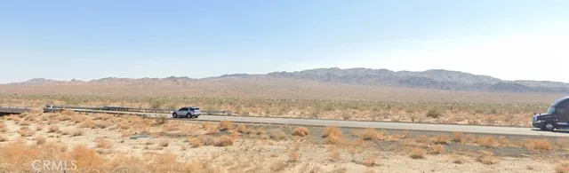 a view of mountain with lake view