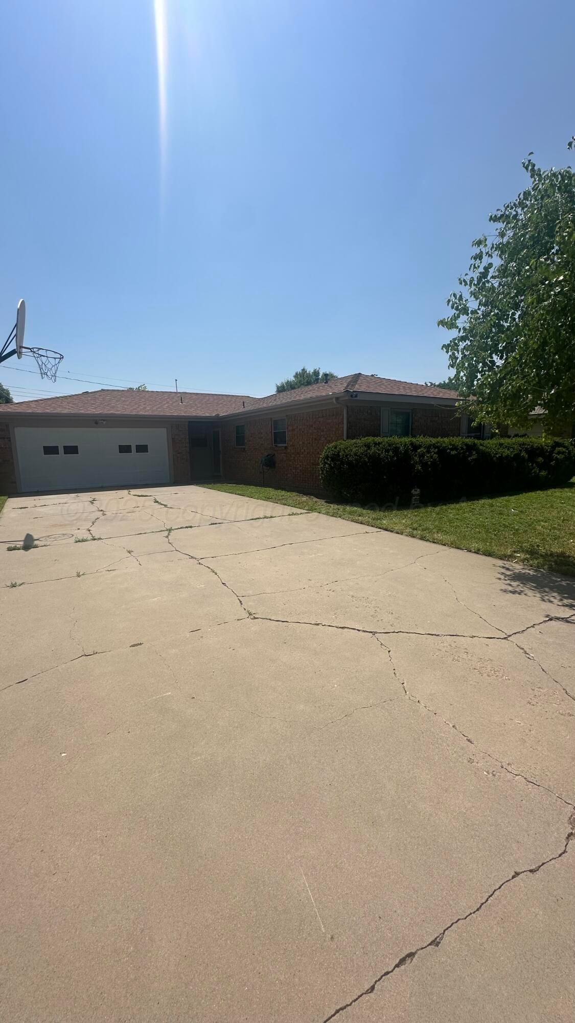 4825 South Austin Street Amarillo, TX 79110 - Photo 2 of 12 a view of a swimming pool and an outdoor space
