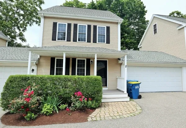 a house view with a garden space
