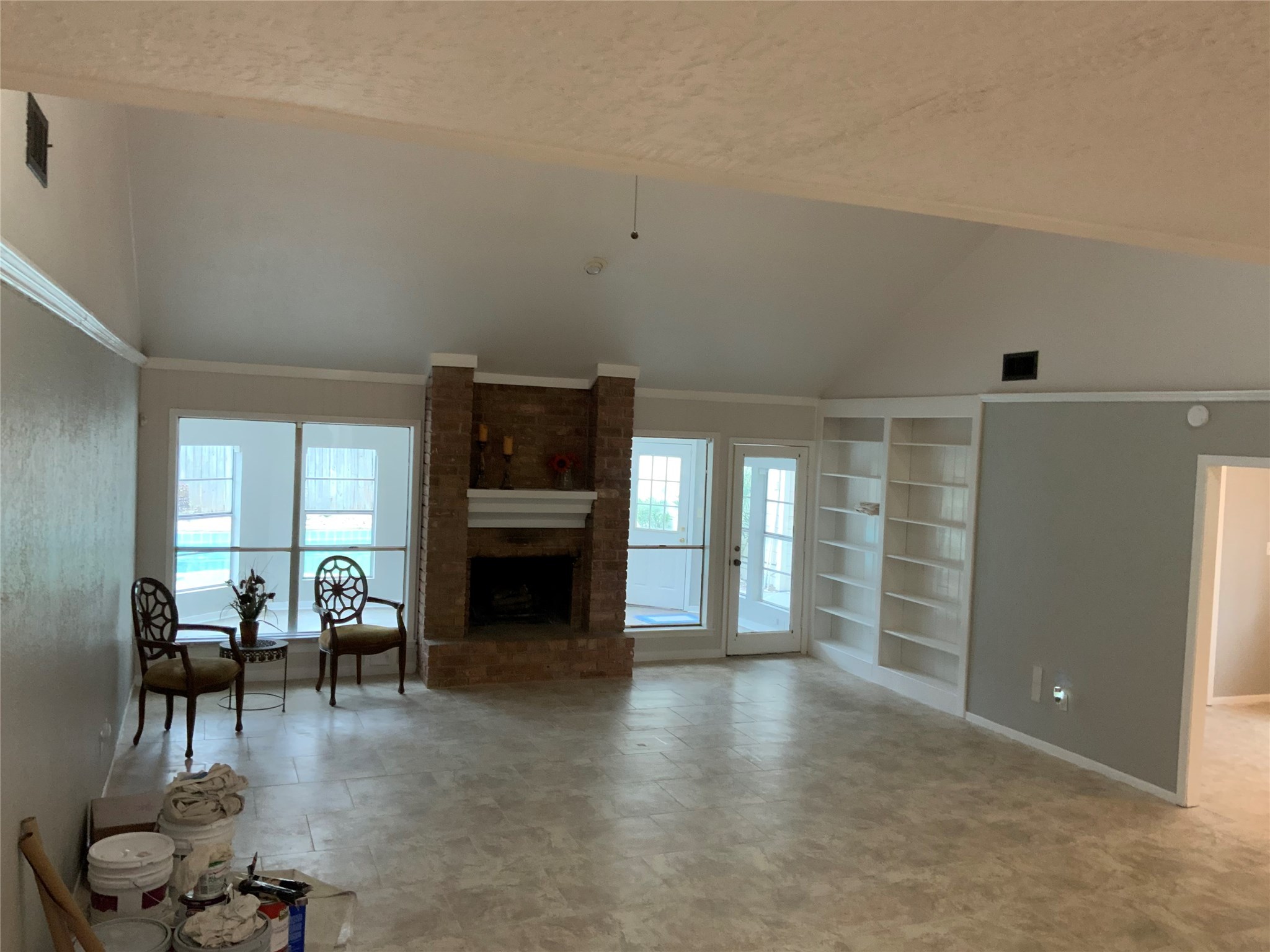 614 Ellingham Drive Katy, TX 77450 - Photo 17 of 23 a living room with furniture and a fireplace