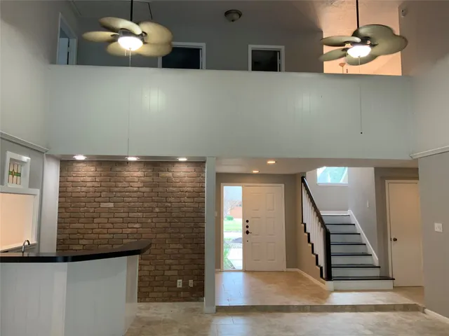 a view of a livingroom with wooden floor