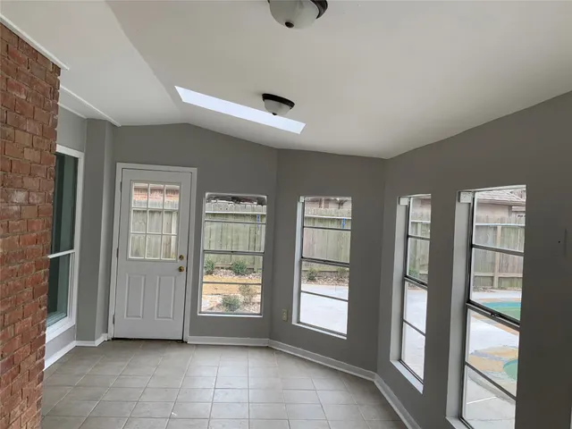 a view of an empty room with window