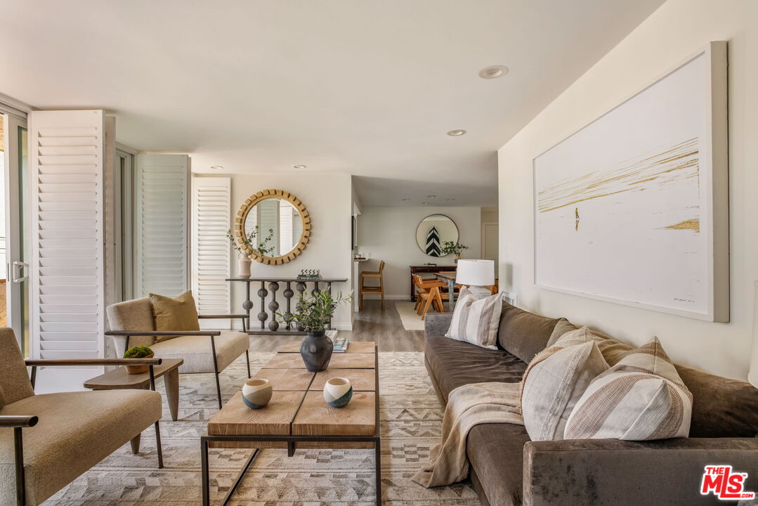 30 Driftwood Street, Unit 4 Marina del Rey, CA 90292 - Photo 6 of 19 a living room with furniture and a large window