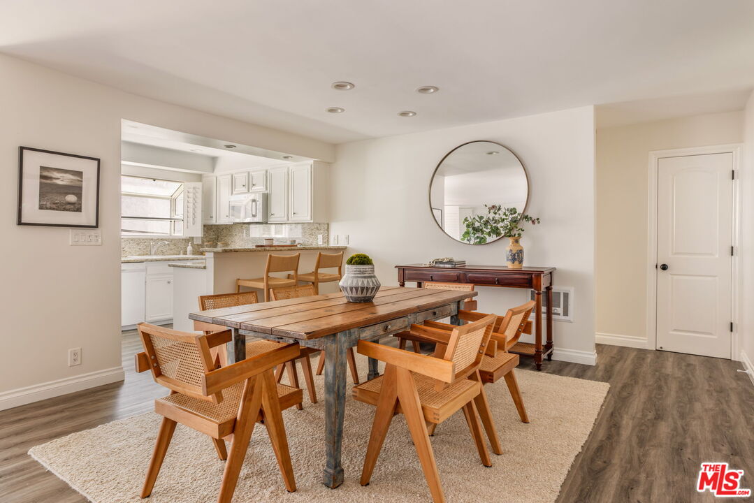 30 Driftwood Street, Unit 4 Marina del Rey, CA 90292 - Photo 7 of 19 a view of a dining room with furniture and wooden floor
