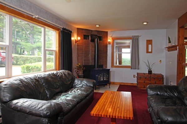 21 Mulpus Road Lunenburg, MA 01462 - Photo 4 of 24 a living room with furniture and a large window