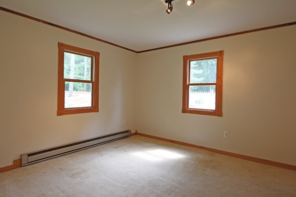 21 Mulpus Road Lunenburg, MA 01462 - Photo 8 of 24 an empty room with windows and closet