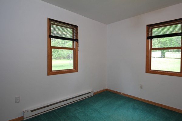 21 Mulpus Road Lunenburg, MA 01462 - Photo 9 of 24 an empty room with a window