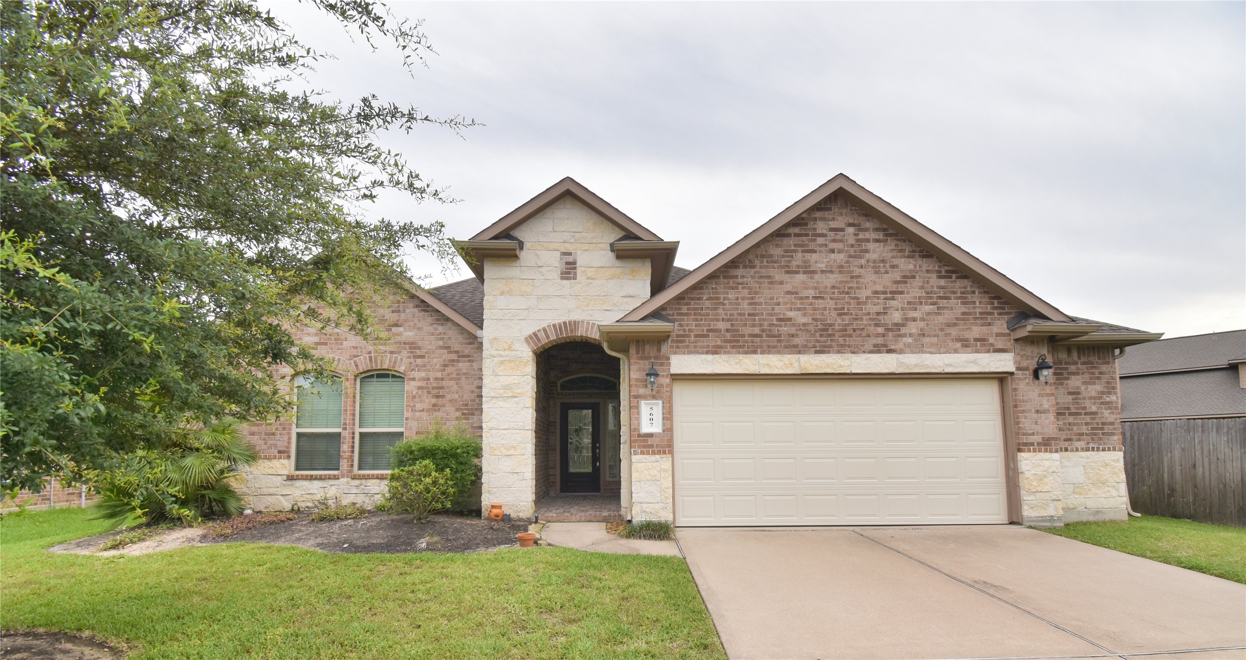 front view of house with a yard