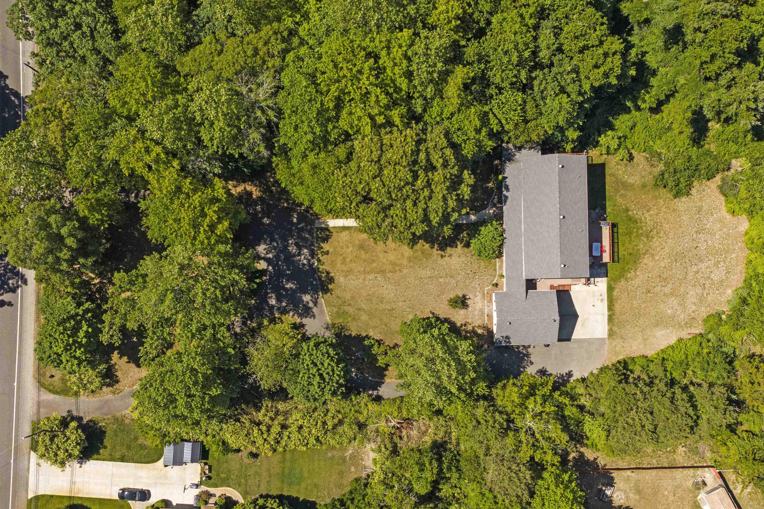 551 Shunpike Road Cape May Court House, NJ 08210 - Photo 42 of 47 an aerial view of residential house with outdoor space and trees all around