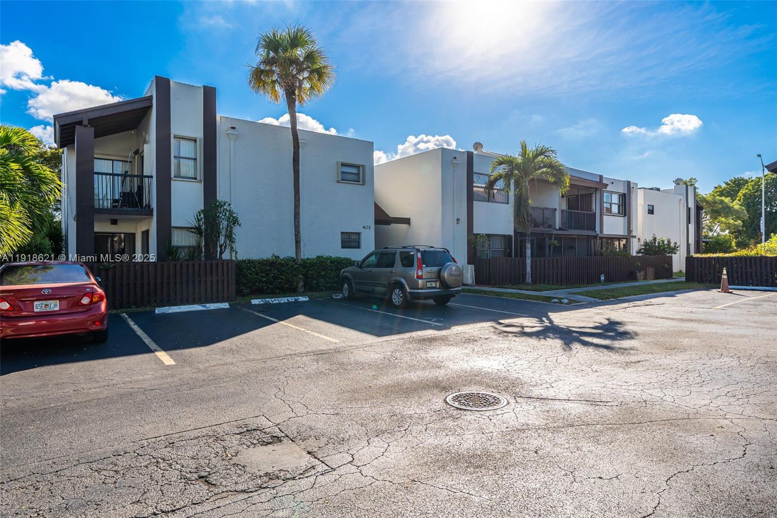 401 Northwest 107th Avenue, Unit 107 Miami, FL 33172 - Photo 2 of 31 a car parked in front of a building