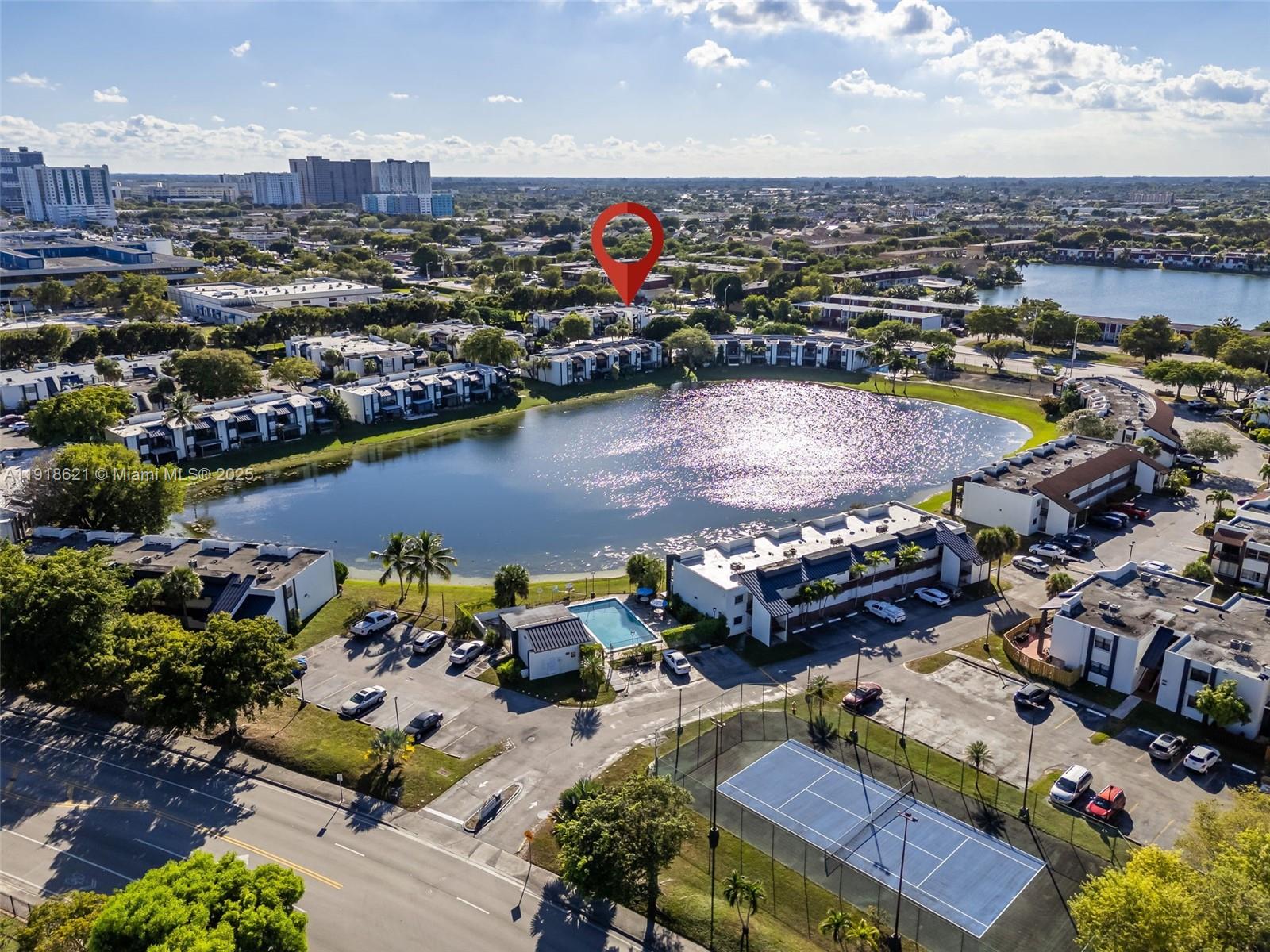 401 Northwest 107th Avenue, Unit 107 Miami, FL 33172 - Photo 29 of 31 an aerial view of a houses with outdoor space