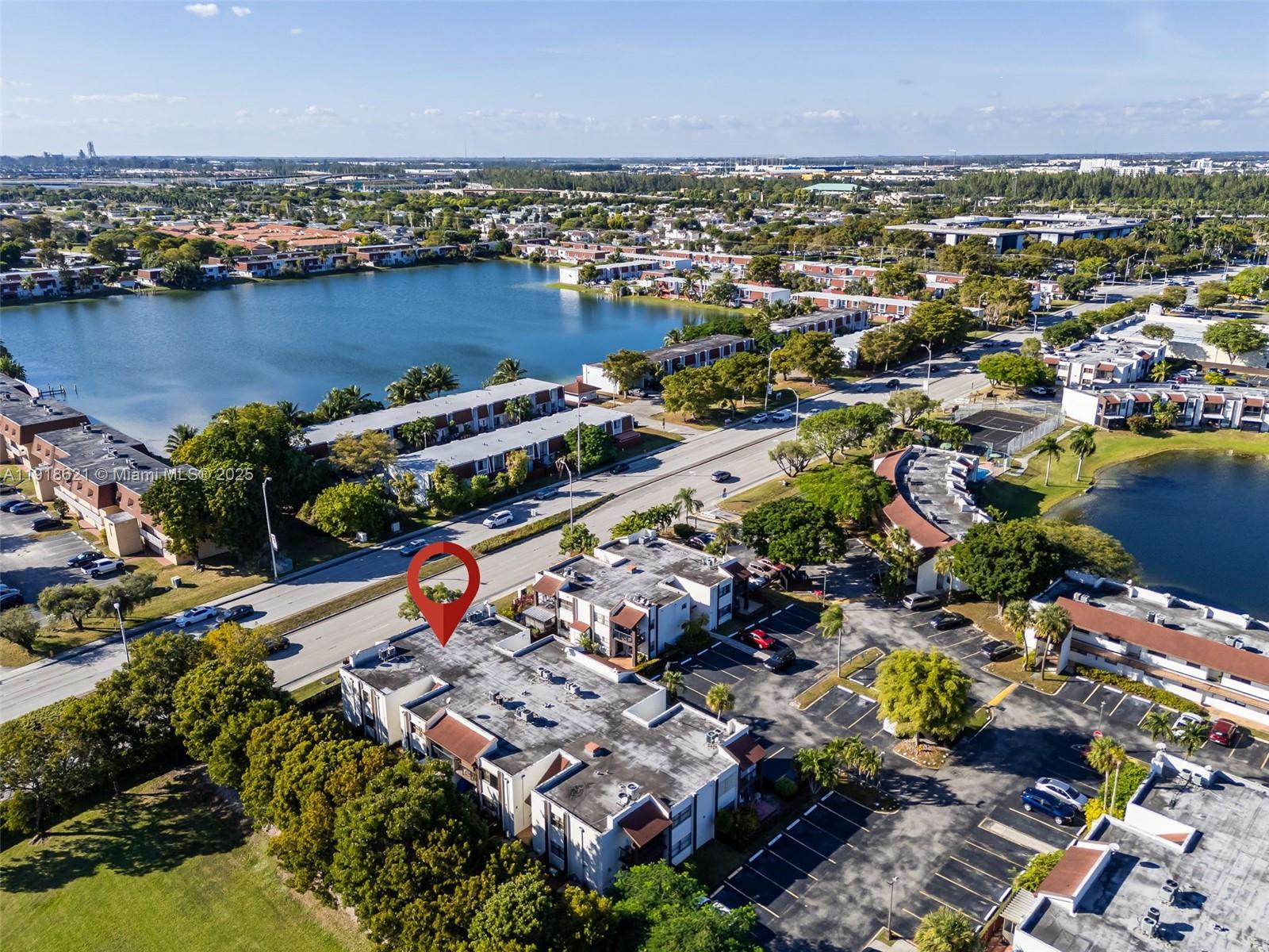 401 Northwest 107th Avenue, Unit 107 Miami, FL 33172 - Photo 30 of 31 an aerial view of residential houses with outdoor space
