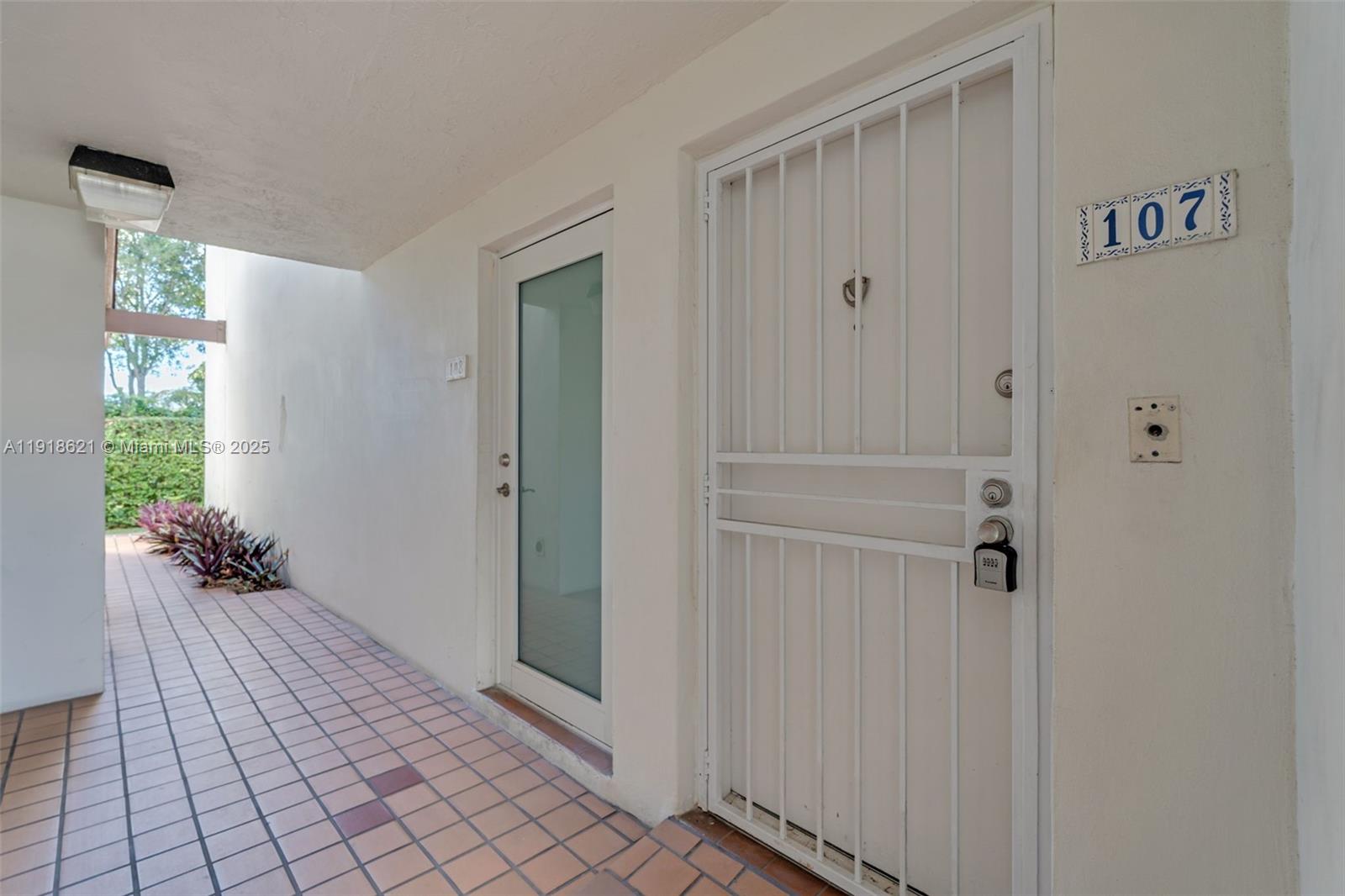 401 Northwest 107th Avenue, Unit 107 Miami, FL 33172 - Photo 3 of 31 a view of a hallway