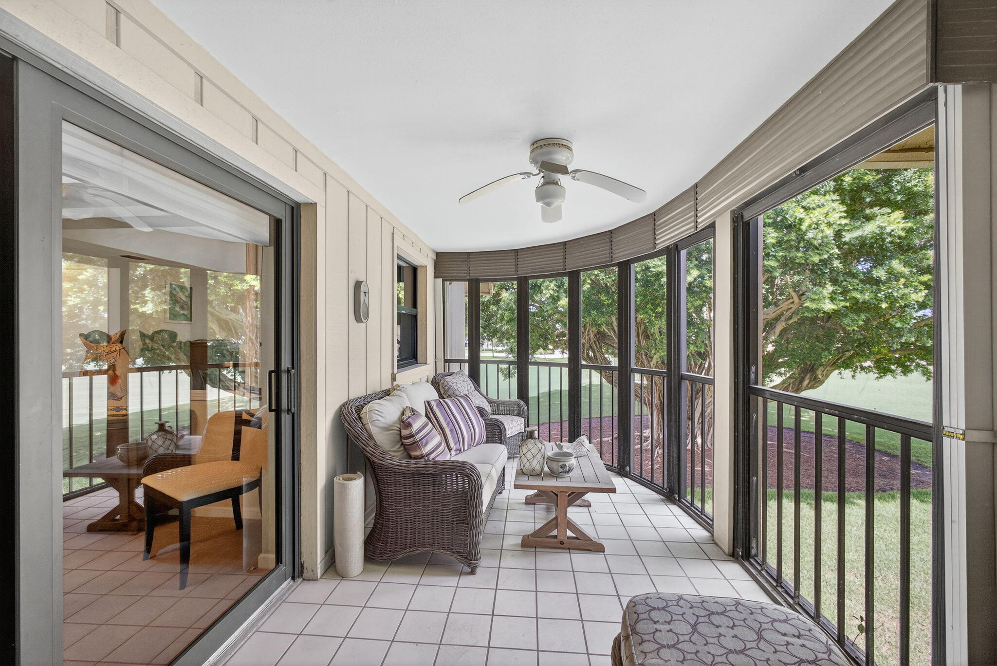 16942 Waterbend Drive, Unit 258 Jupiter, FL 33477 - Photo 15 of 33 a living room with furniture and a floor to ceiling window