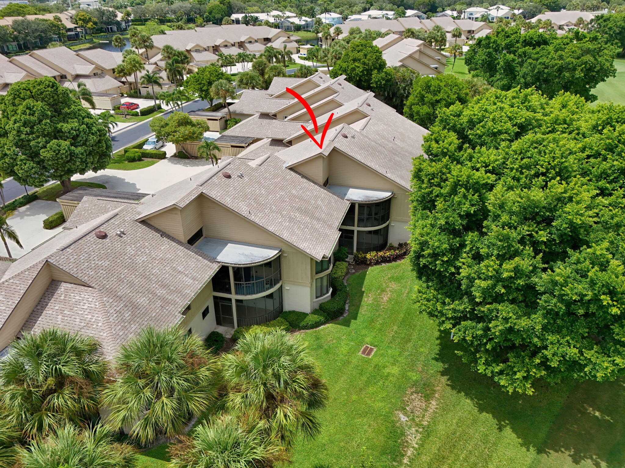 16942 Waterbend Drive, Unit 258 Jupiter, FL 33477 - Photo 24 of 33 an aerial view of a house with a yard