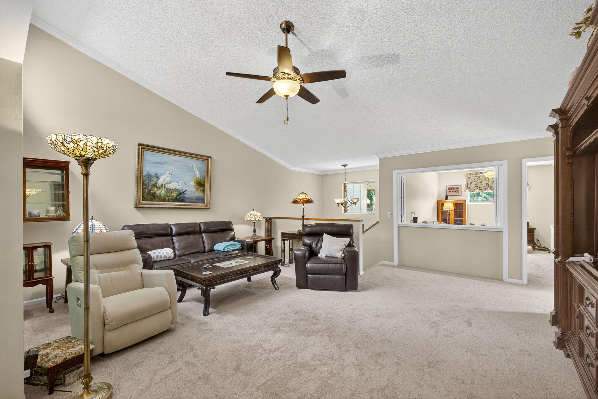 16942 Waterbend Drive, Unit 258 Jupiter, FL 33477 - Photo 3 of 33 a living room with furniture and a chandelier
