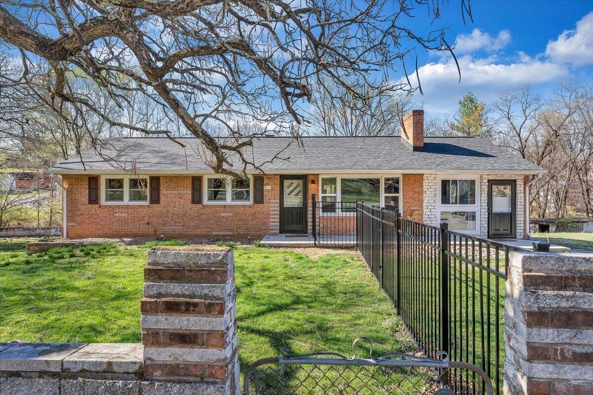 2129 Twelve Oclock Knob Road Salem, VA 24153 - Photo 1 of 48 a front view of a house with garden