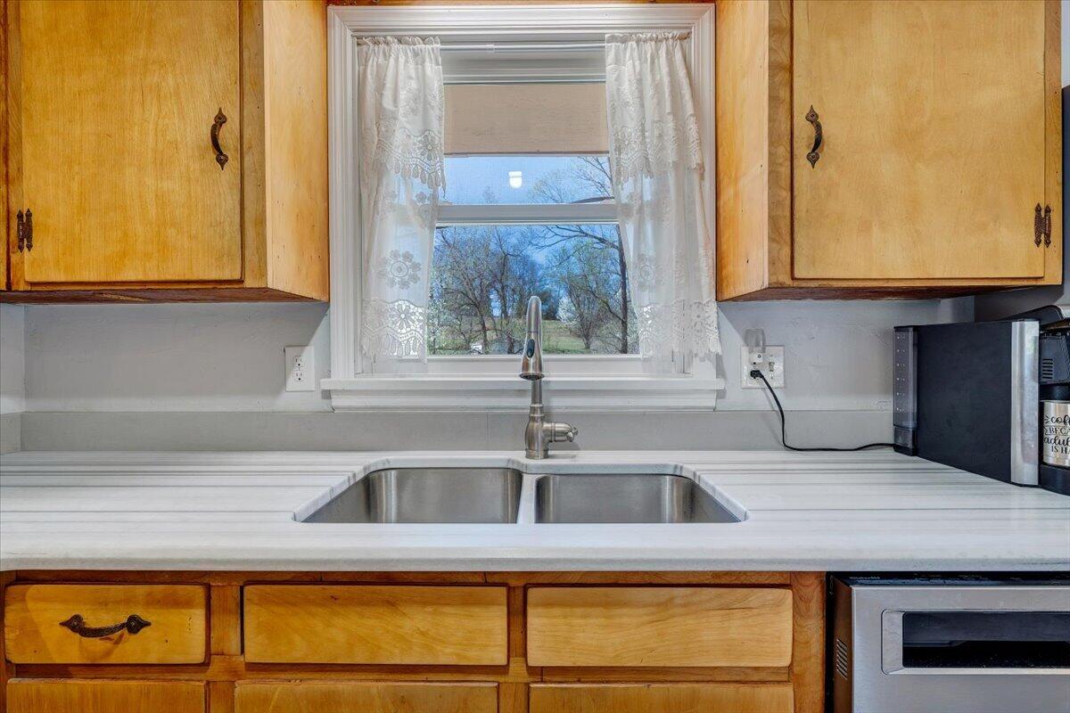 2129 Twelve Oclock Knob Road Salem, VA 24153 - Photo 13 of 48 a kitchen with a sink and a window