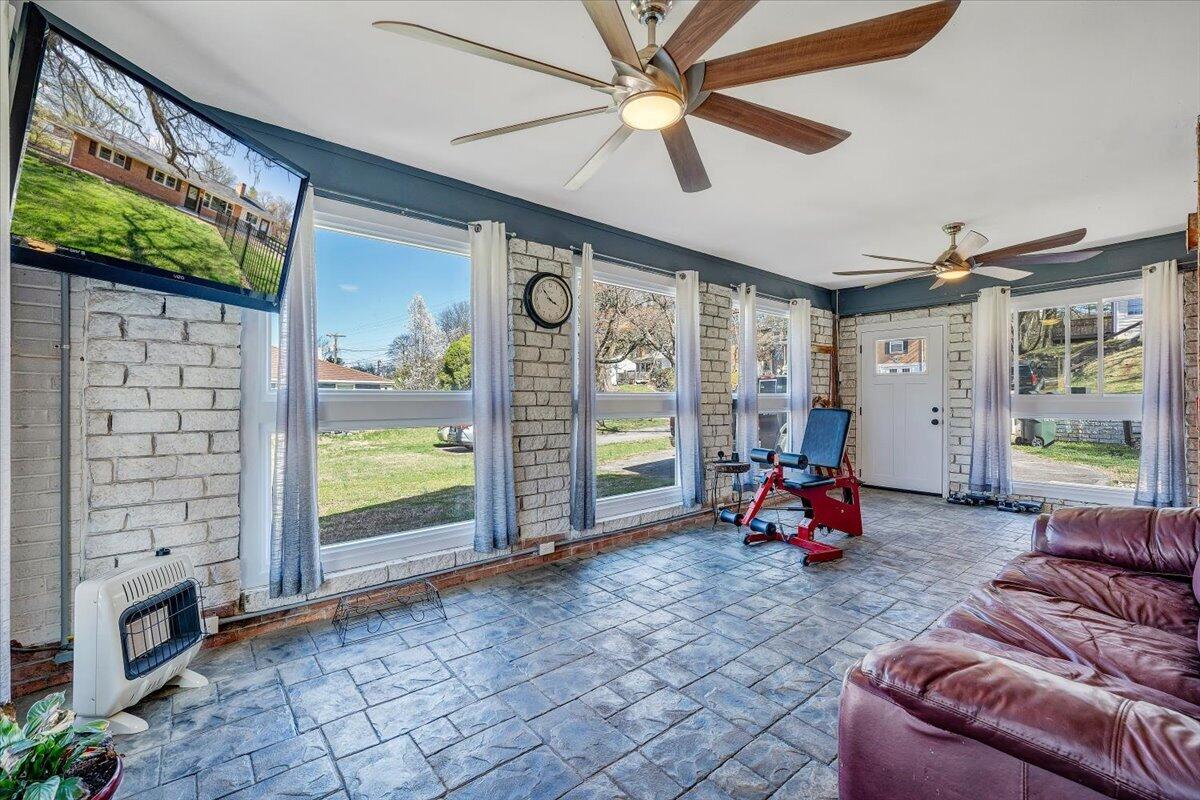 2129 Twelve Oclock Knob Road Salem, VA 24153 - Photo 26 of 48 a view of a livingroom with furniture and floor to ceiling window