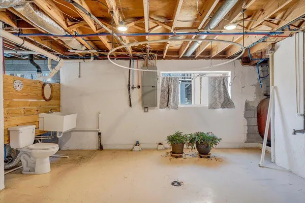 a bathroom with a toilet and a sink