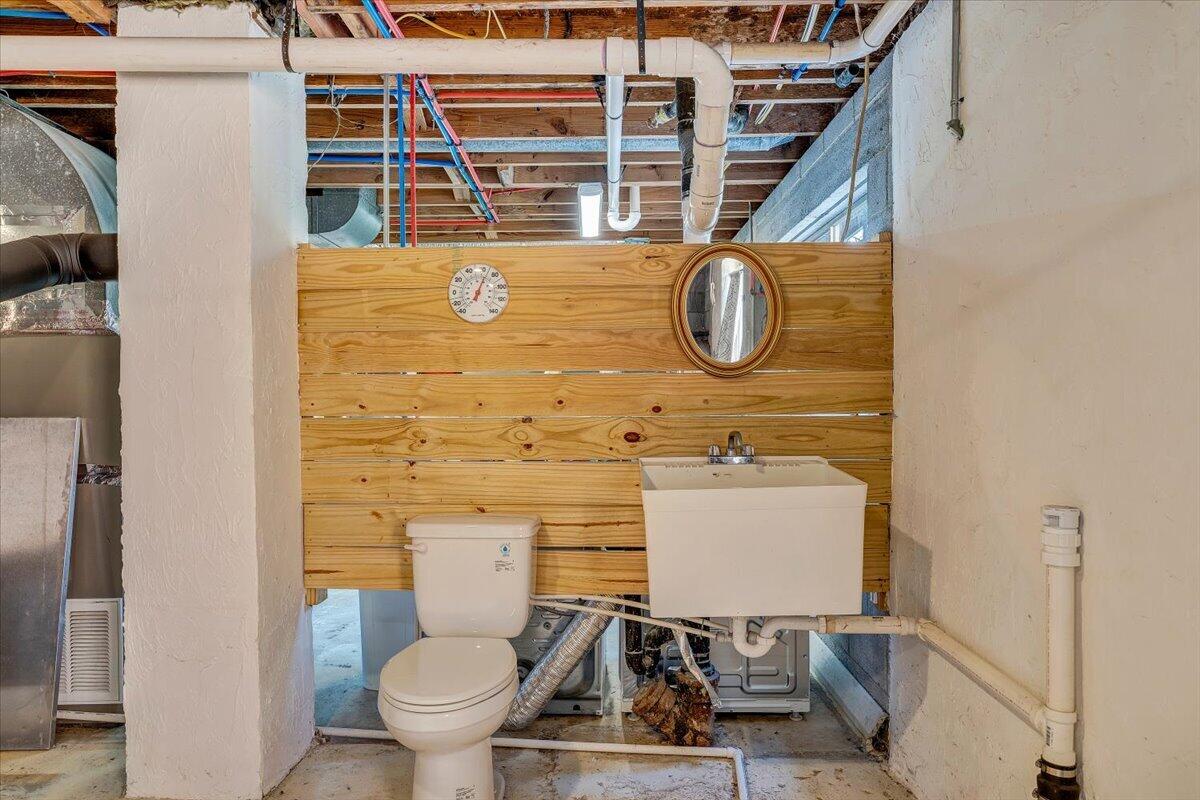 2129 Twelve Oclock Knob Road Salem, VA 24153 - Photo 34 of 48 a bathroom with a toilet and a sink