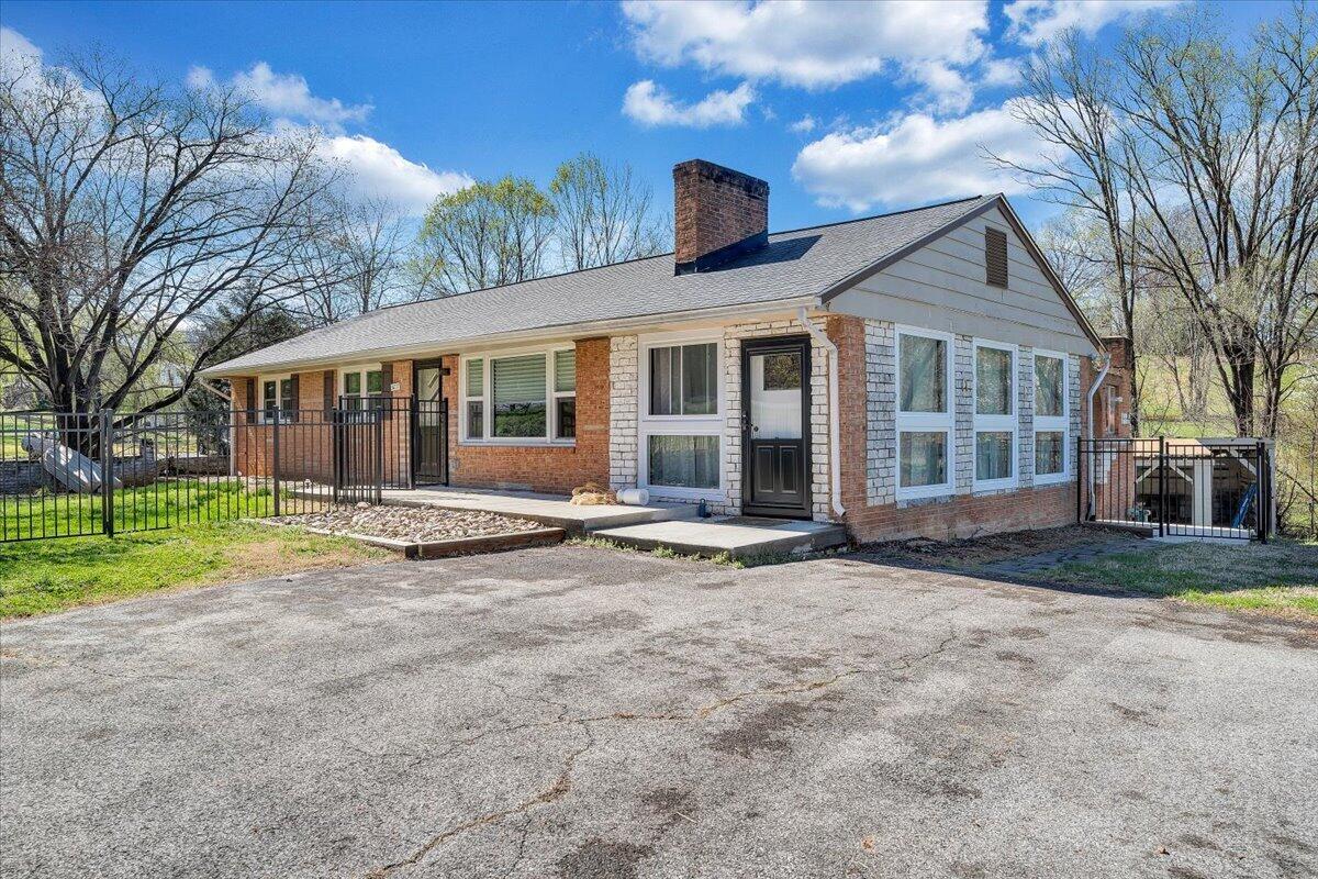 2129 Twelve Oclock Knob Road Salem, VA 24153 - Photo 46 of 48 a view of a house with a yard and large tree